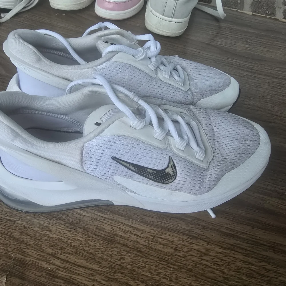 White Nike Sneakers with Black Swoosh